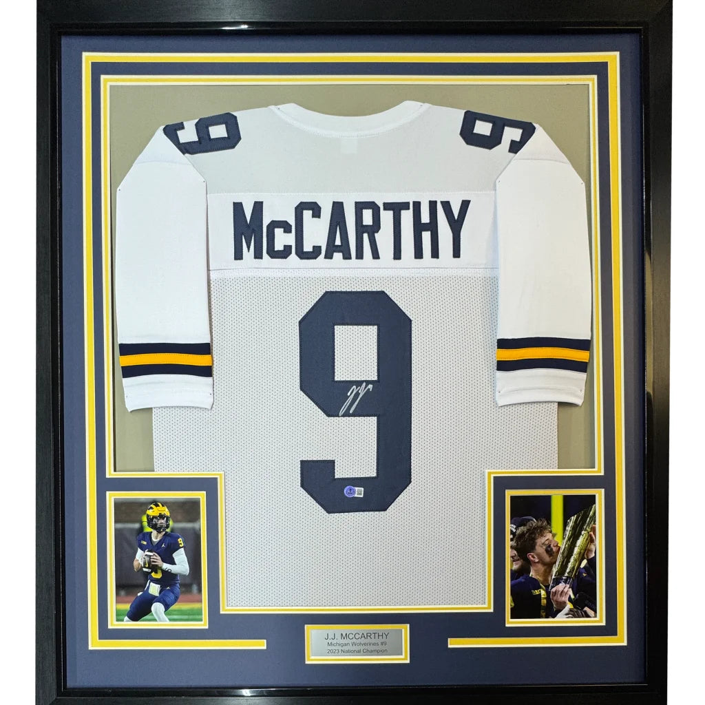 Framed Autographed J.J. JJ McCarthy 35x39 Michigan White College Football Jersey Beckett BAS COA | Hall of Fame Sports Memorabilia | vintageantiquesgifts.com