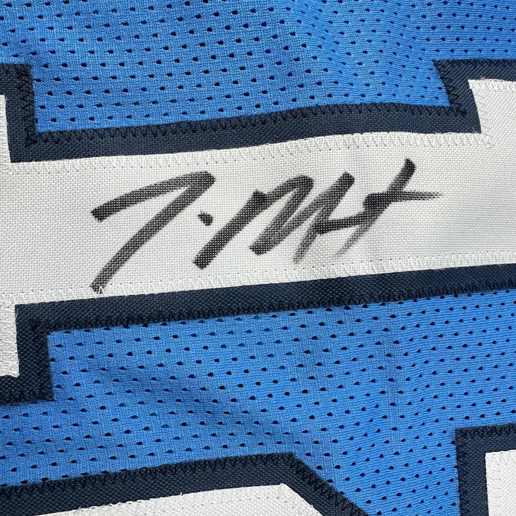 Light blue mesh Memphis Grizzlies jersey signed by Ja Morant with black marker autograph