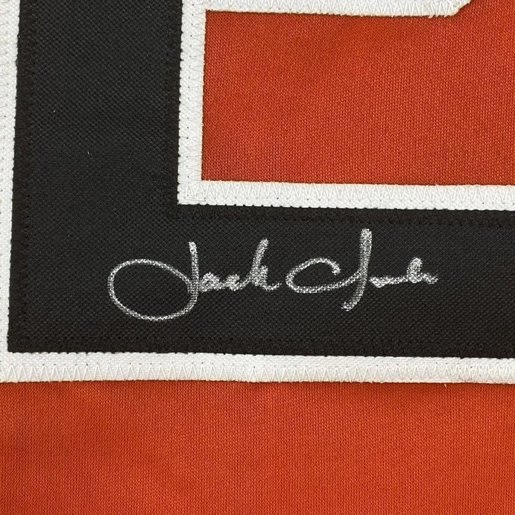 Framed autographed Jack Clark San Francisco orange baseball jersey with black and orange woven scarf, white trim, and silver thread signature, 35x39 inches, JSA COA