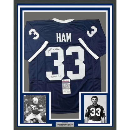 Back of a framed autographed navy blue penn state nittany lions football jersey with white 33 ham name and chof 90 sticker