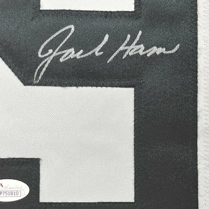Framed autographed black and white embroidered jersey number 88 with silver thread signature on pittsburgh bumble bee jersey