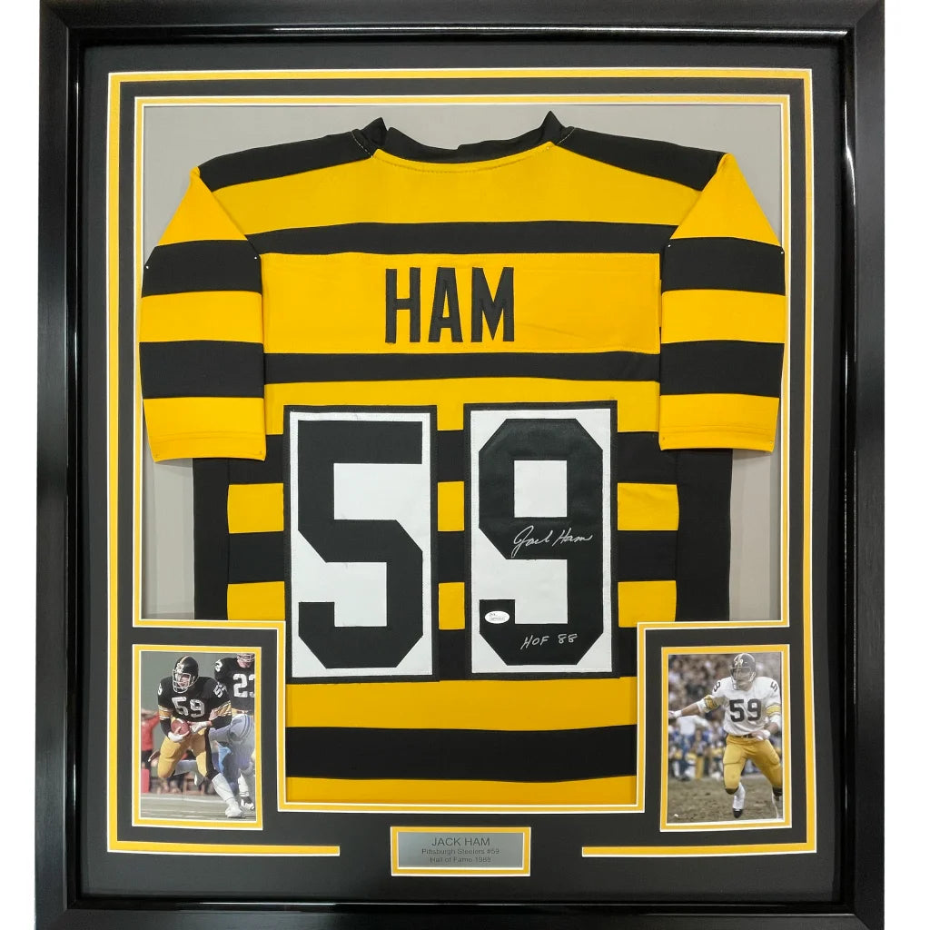 Back of a yellow and black striped framed autographed jack ham hall of fame 88 football jersey with number 59