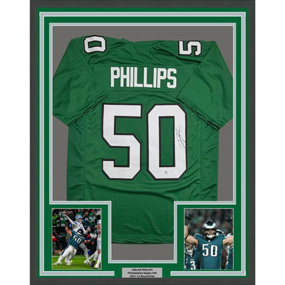 Back of framed autographed Jaelan Phillips green Eagles jersey, number 50, PSA/DNA COA