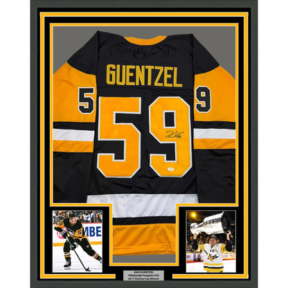 Framed Autographed Jake Guentzel 35x39 Pittsburgh Black Hockey Jersey JSA COA | Hall of Fame Sports Memorabilia | vintageantiquesgifts.com