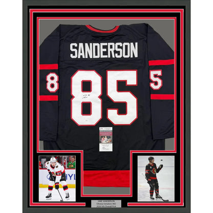 Framed Autographed Jake Sanderson 35x39 Ottawa Black Hockey Jersey JSA COA | Hall of Fame Sports Memorabilia | vintageantiquesgifts.com