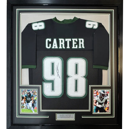 Framed Jalen Carter autographed Eagles jersey with player photos, perfect for your man cave