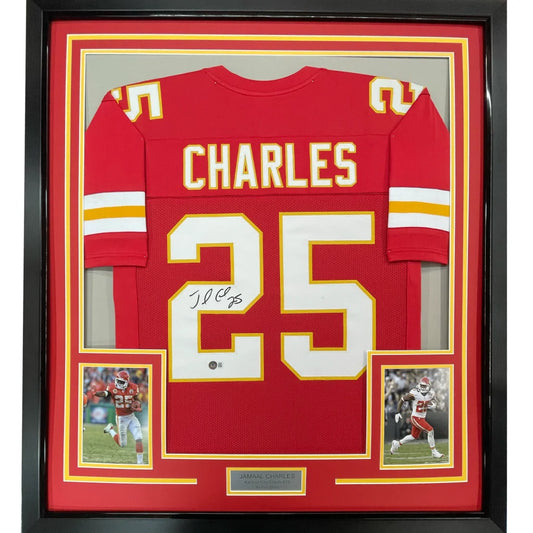 Framed autographed red kansas city chiefs football jersey with white and gold charles 25 lettering signed by jamaal charles