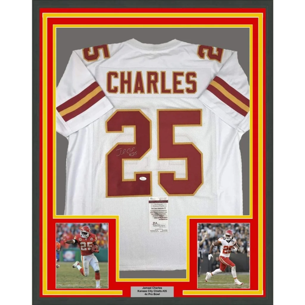 Back side of a framed autographed white kansas city chiefs football jersey with maroon and gold charles 25 lettering