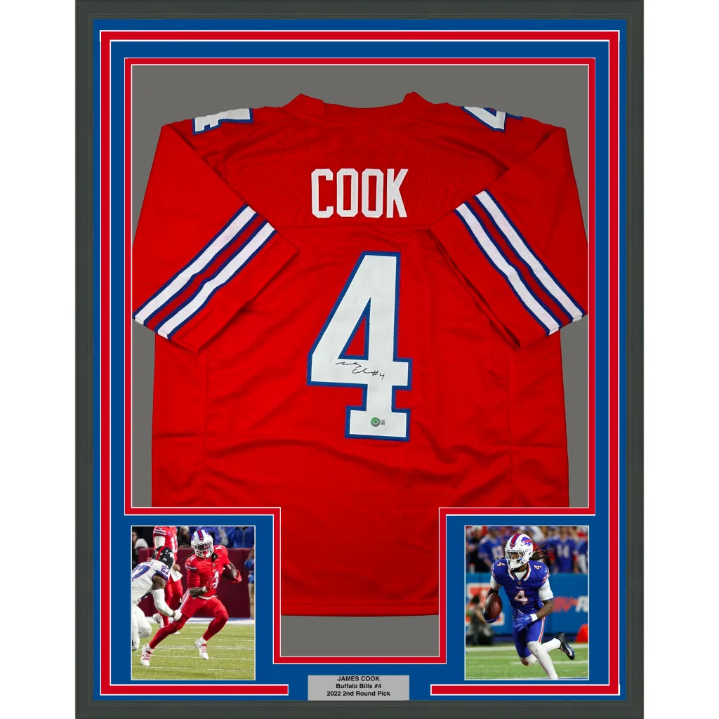 Framed red sports jersey with white lettering and numbers for man cave