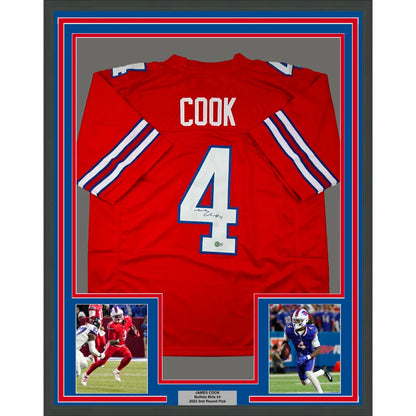 Framed red sports jersey with white lettering and numbers for man cave