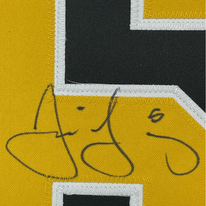 Autographed yellow and black Jaromir Jagr hockey jersey perfect for your man cave