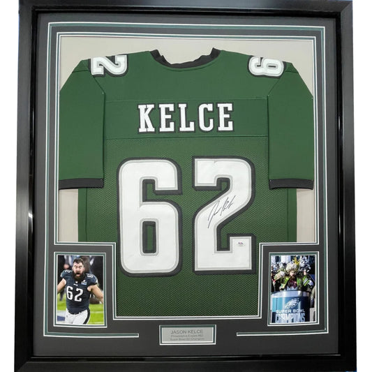 Framed autographed green and white philadelphia eagles football jersey number 62 in black display case