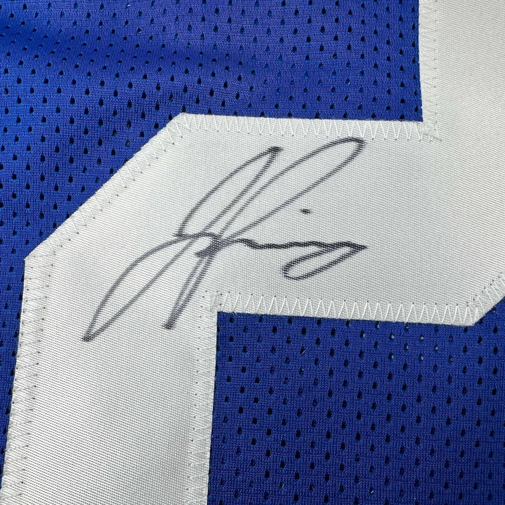 Blue Jayson Pinnock Giants jersey with white number and black autograph for display