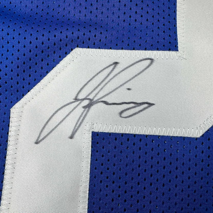 Blue Jayson Pinnock Giants jersey with white number and black autograph for display