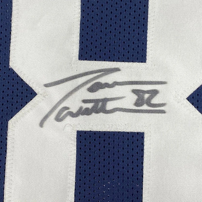 Framed Jason Witten autographed white and blue striped jersey with photos