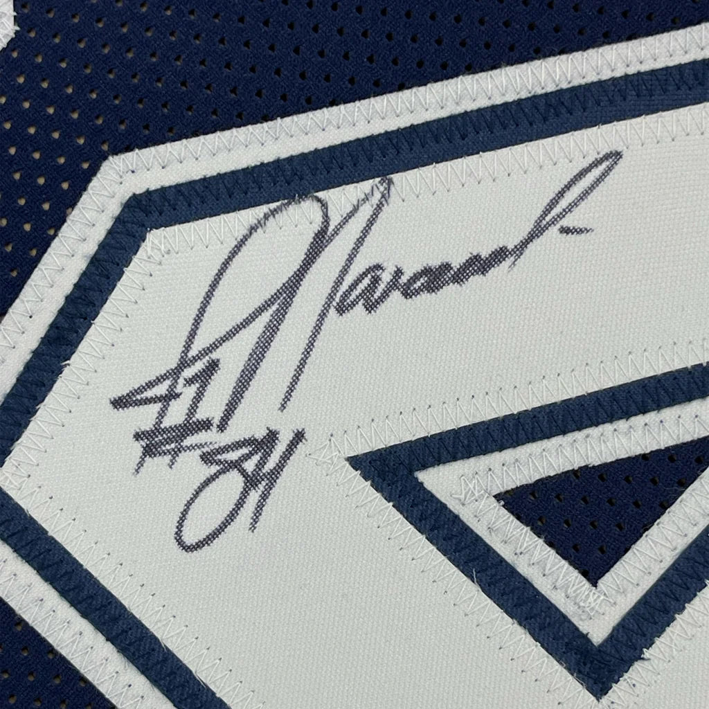 Autographed Jay Novacek jersey with player number, perfect for your man cave decor