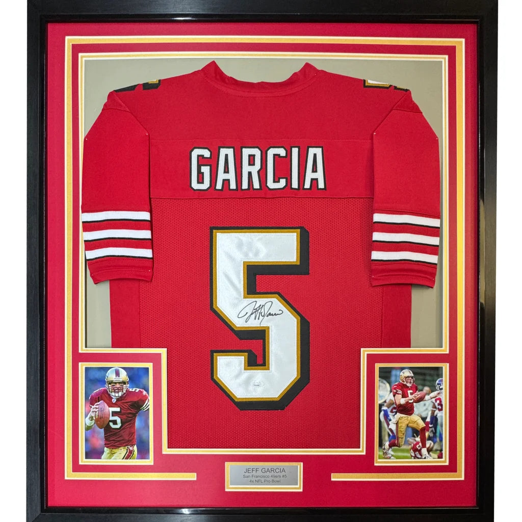 Framed autographed red San Francisco 49ers football jersey with white and gold number 5 and name Garcia signed by Jeff Garcia