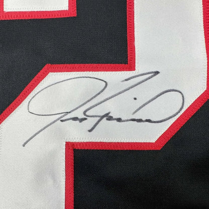 Autographed Jeremy Roenick hockey jersey with framed autograph number display