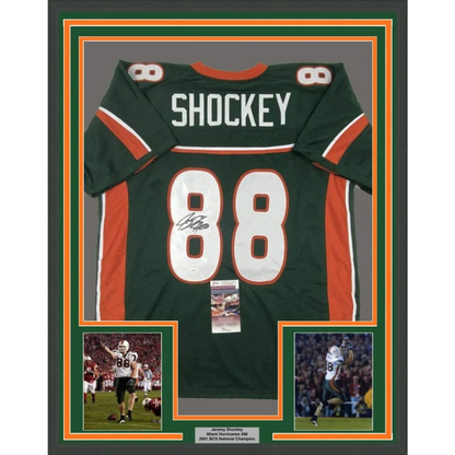 Framed autographed Miami hurricanes green and orange football jersey with name Shockey and number 88 signed by Jeremy Shockey