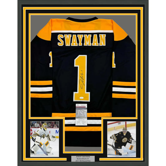 Framed Jeremy Swayman Boston Bruins signed jersey with two player photos for display