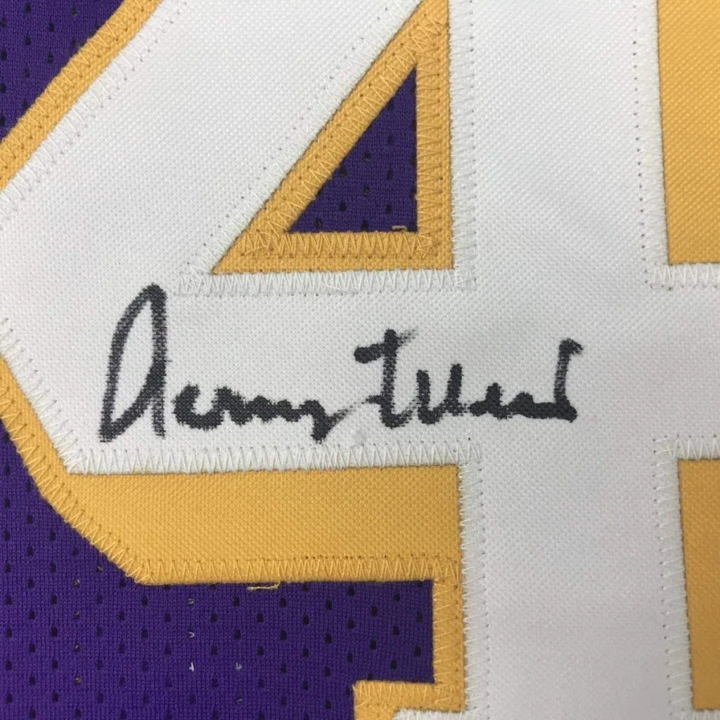 Framed signed Kareem Abdul-Jabbar jersey on white, purple, gold mesh