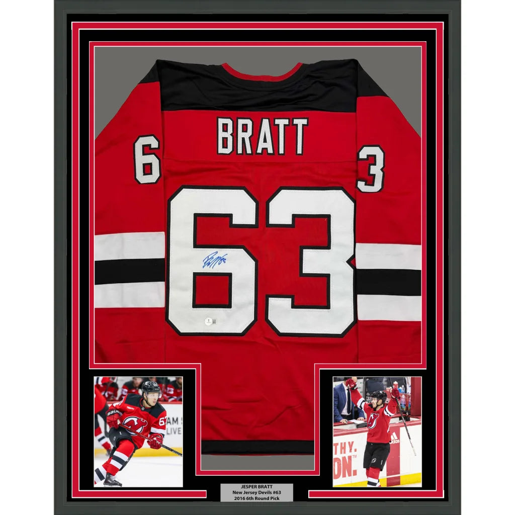 Framed autographed Jesper Bratt red New Jersey Devils jersey with number 63