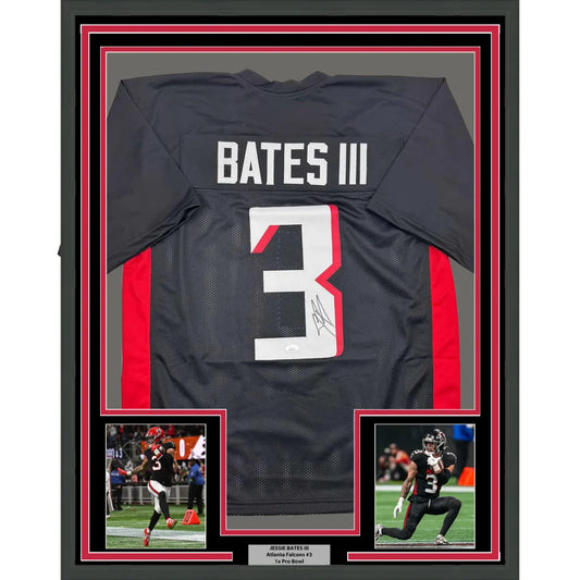 Framed Jesse Bates III autographed football jersey with action photos and plaque for man cave