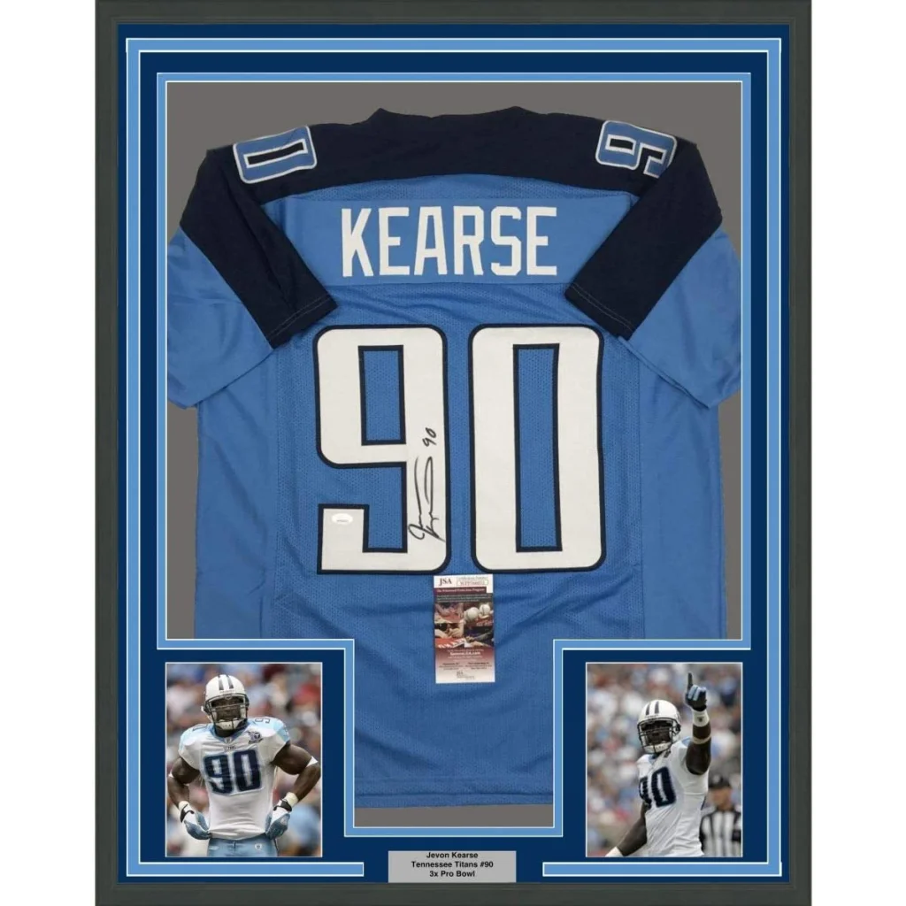 Autographed Tennessee Titans Jevon Kearse jersey with photos in a frame ready for display
