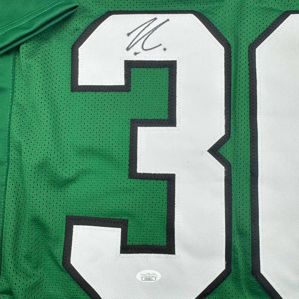 Signed green Eagles jersey with white numbers for man cave collection