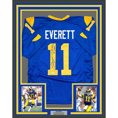 Framed autographed blue LA Rams Jim Everett jersey with Everett 11