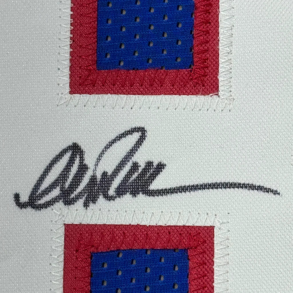 Autographed jersey patch on Buffalo Bills Dynasty jersey with photos