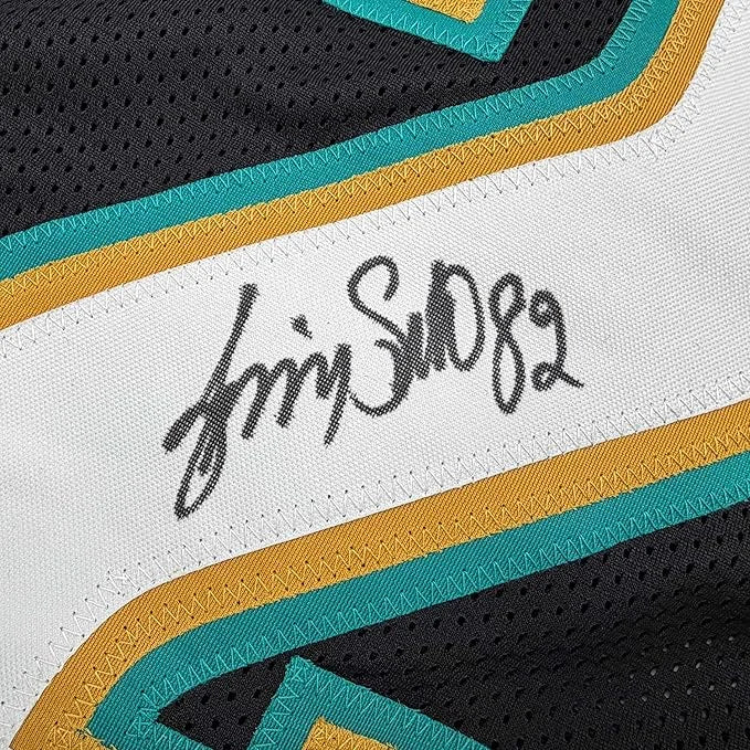 Framed Autographed Jimmy Smith 35x39 Jacksonville Black Football Jersey Beckett BAS COA | Certified Authentic Signed Memorabilia | vintageantiquesgifts.com
