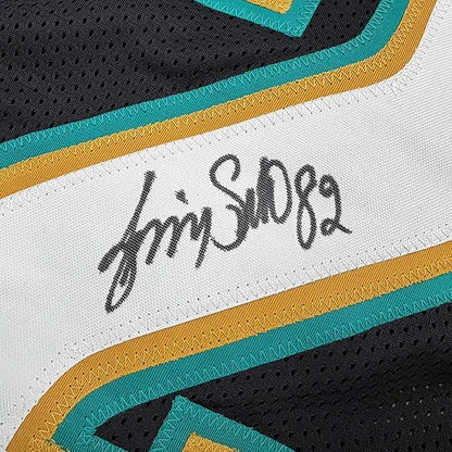 Framed Autographed Jimmy Smith 35x39 Jacksonville Black Football Jersey Beckett BAS COA | Certified Authentic Signed Memorabilia | vintageantiquesgifts.com