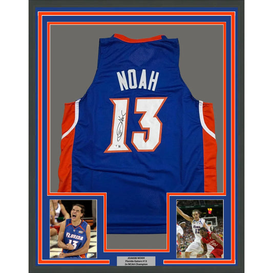 Framed Autographed Joakim Noah 35x39 Florida Blue College Basketball Jersey Beckett BAS COA | Hall of Fame Sports Memorabilia | vintageantiquesgifts.com