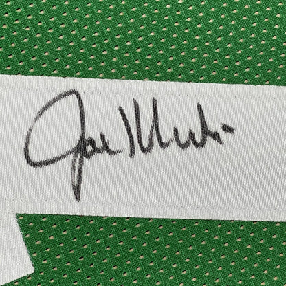 Autographed white fabric tag on green mesh jersey in professionally framed Joe Klecko signed jersey with Beckett BAS