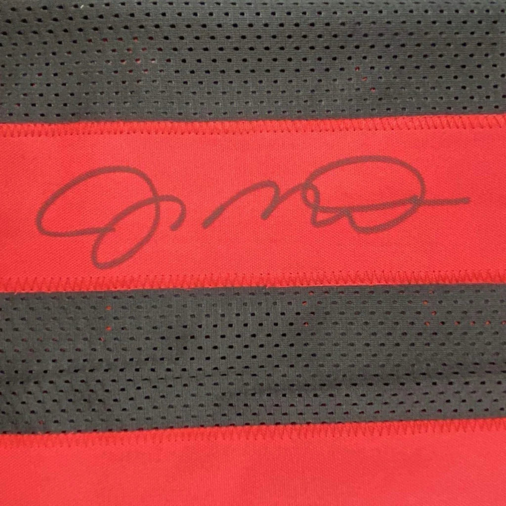 Red and grey striped athletic fabric jersey with Joe Montana signature and JSA COA for man cave