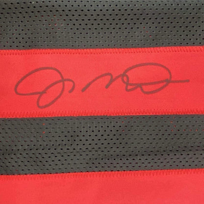 Red and grey striped athletic fabric jersey with Joe Montana signature and JSA COA for man cave