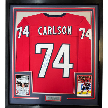 Framed and autographed John Carlson #74 hockey jersey ready for display