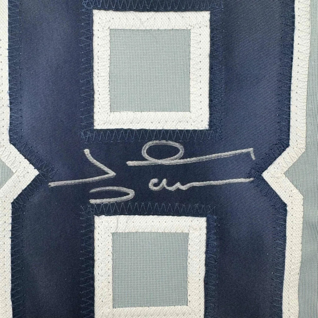 Autographed navy blue and white Johnny Damon Yankees jersey ready to display