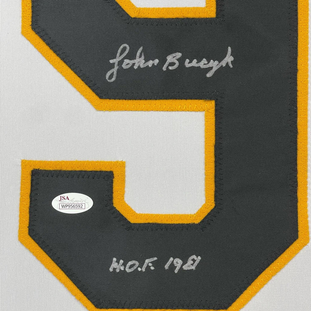 White Johnny Bucyk HOF jersey with signature, black and gold number 9, perfect for your man cave