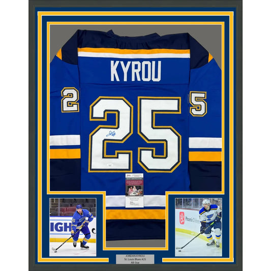 Framed autographed Blue Hockey Jersey with Player Photos from Championship Blue Jersey