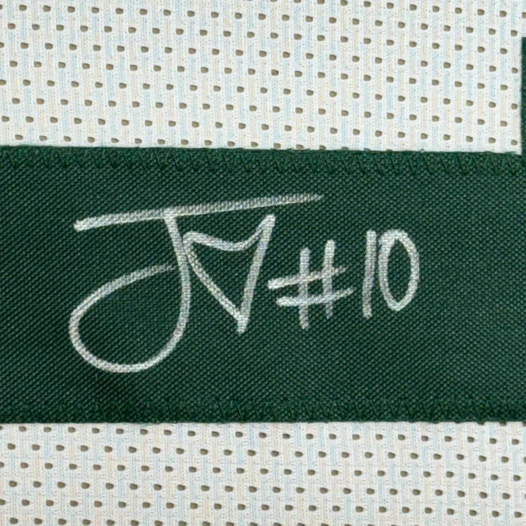 Dark green woven label with white embroidered script jn#10 on a framed autographed jordan love green bay jersey