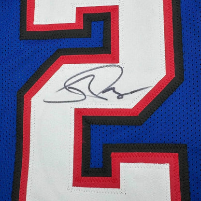 Blue Jordan Poyer Bills jersey with autograph, perfect for your wall display