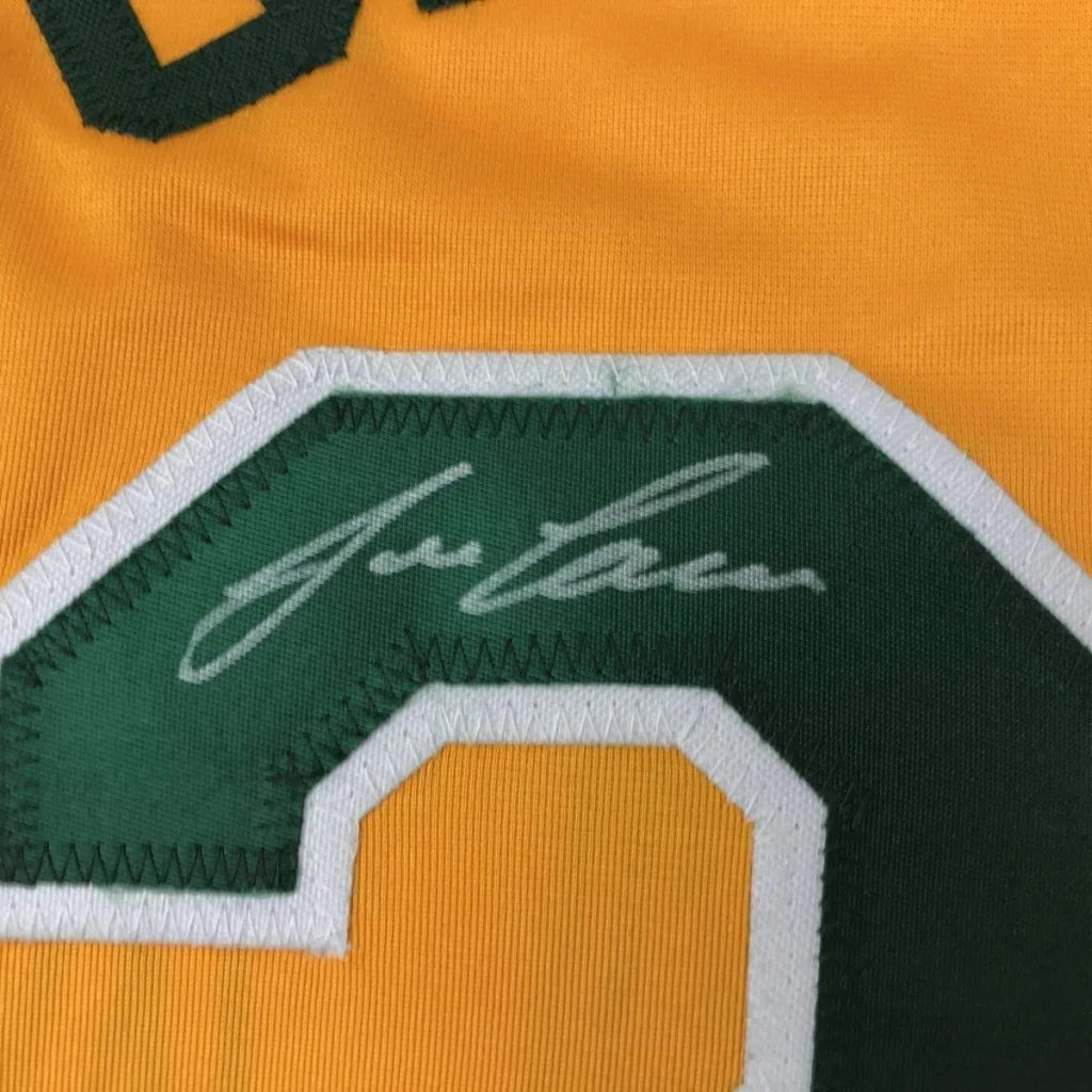 Green and gold Jose Canseco signed jersey with autograph, perfect for your man cave
