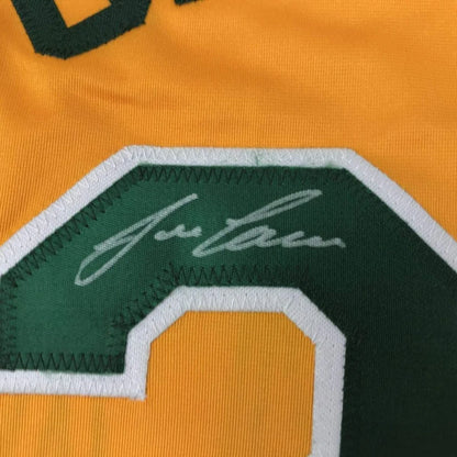 Green and gold Jose Canseco signed jersey with autograph, perfect for your man cave