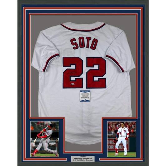 Back side of a white washington baseball jersey with red soto lettering and number 22 autographed and framed