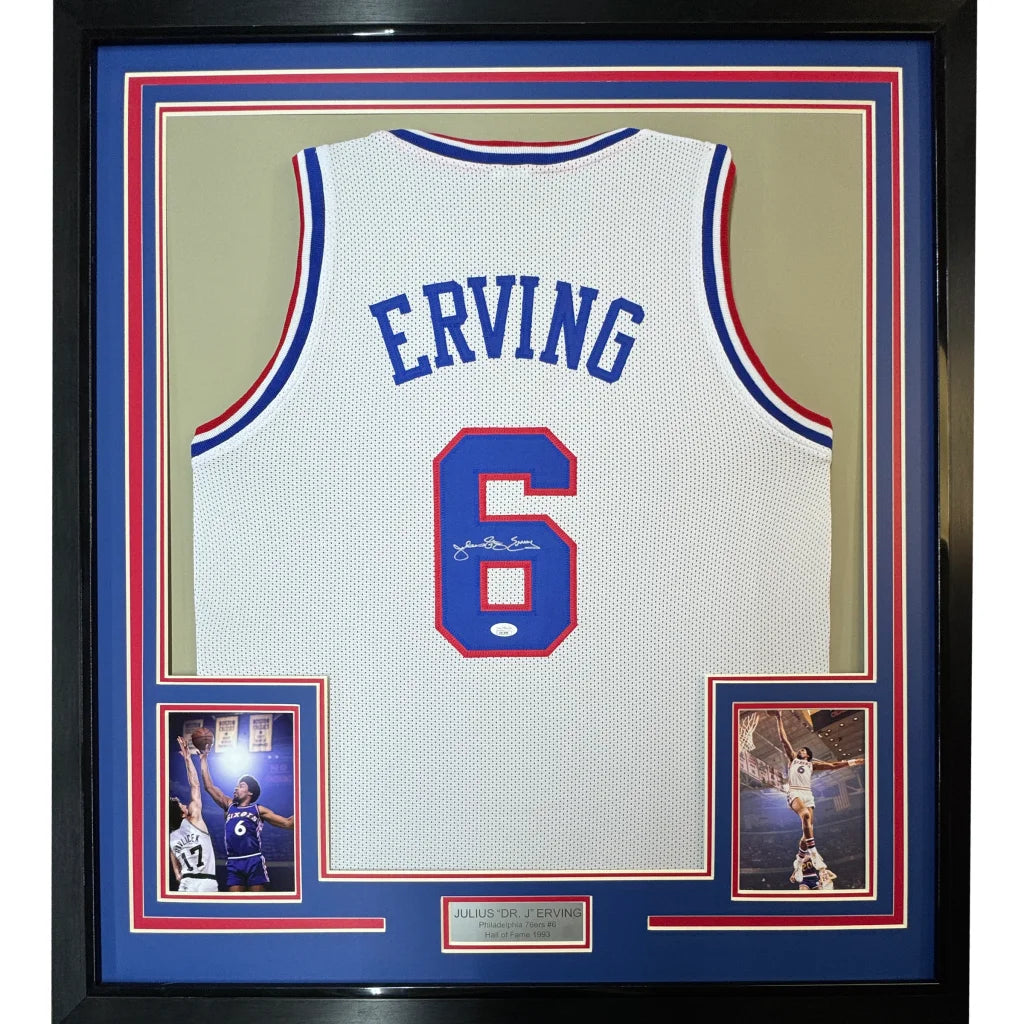 Framed Julius Dr J Erving autographed basketball jersey with commemorative photos on display