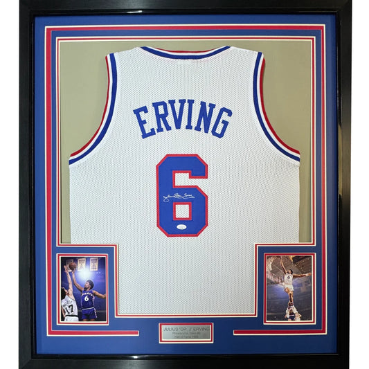 Framed Julius Dr J Erving autographed basketball jersey with commemorative photos on display