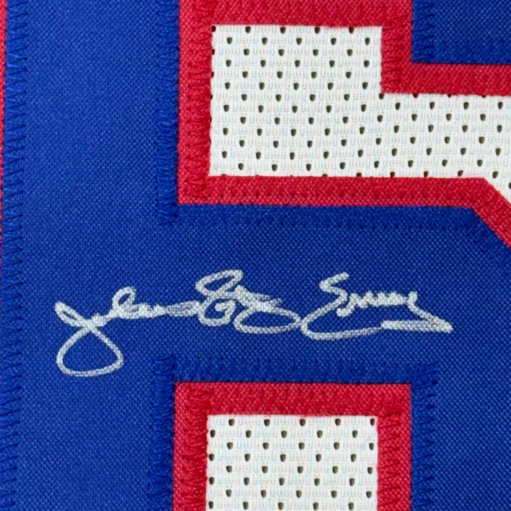 Autographed blue and red Sports Jersey displayed in Framed Dr J Erving memorabilia