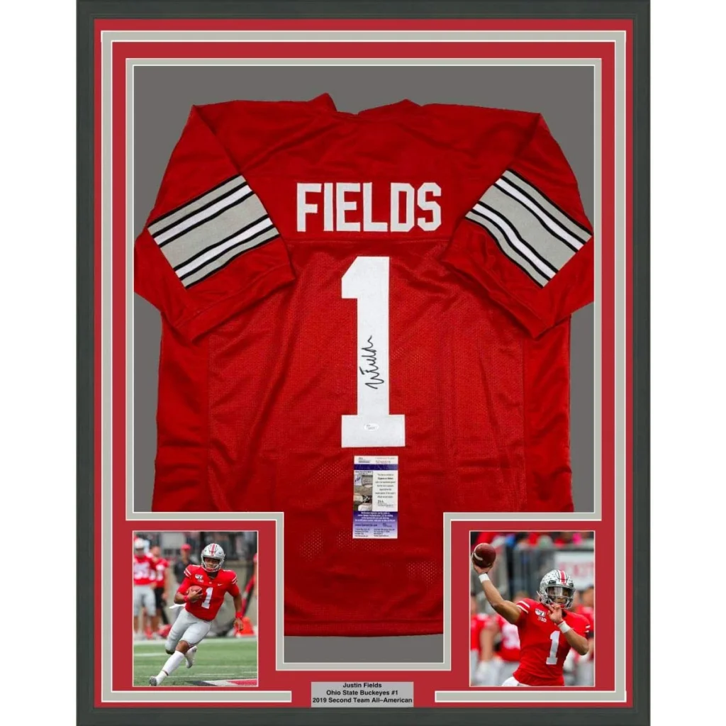 Back side of framed autographed ohio state red football jersey with white number one fields and silver sleeve stripes